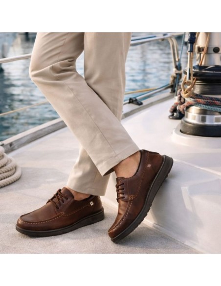 Brown leather boat shoe